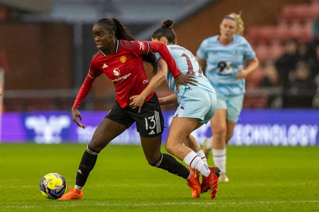 18th January 2026; Leigh Sports Village, Manchester, England; Womens FA Cup Football, Manchester United, ManU versus Burnley; Simi Awujo of Manchester United Women under pressure from Millie Chandarana of Burnley Women  TimxWilliams Content restricted for UK based newspaper