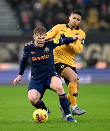 Lewis Hall of Newcastle United and Joao Gomes of Wolverhampton Wanderers Wolverhampton Wanderers v Newcastle United, Premier League, Football, Molineux, Wolverhampton, UK - 18 Jan 2026Wolverhampton Molineux United Kingdom EDITORIAL USE ONLY No use with unauthorised audio, video, data, fixture lists, club league logos or live services. Online in-match use limited to 120 images, no video emulation. No use in betting, games or single club league player publications.  Copyright: xAnnaxGowthorpe Shutterstockx 16348228ad
