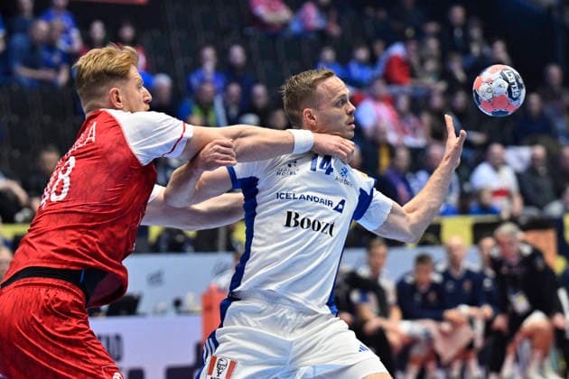 KRISTIANSTAD, SWEDEN 20260118 Poland s Tomasz Gebala and Iceland s Omar Ingi Magnusson in action during the 2026 EHF European Men s Handball Championship (the EHF Euro 2026) match between Poland and Iceland at Kristianstad Arena, in Kristianstad, Sweden, on January 18, 2026. KRISTIANSTAD SWEDEN x50090x