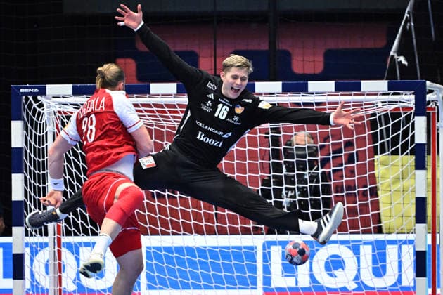 KRISTIANSTAD, SVERIGE 20260118 Iceland s goalkeeper Viktor Hallgrimsson and Poland s Maciej Gebala in action during the 2026 EHF European Men s Handball Championship (the EHF Euro 2026) match between Poland and Iceland at Kristianstad Arena, in Kristianstad, Sweden, on January 18, 2026. KRISTIANSTAD SVERIGE x50090x