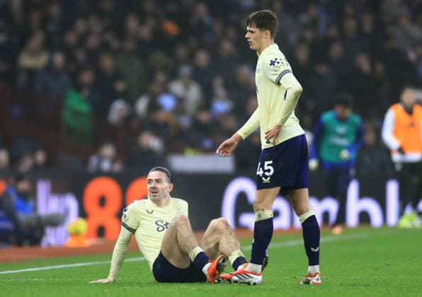 Birmingham, England, 18th January 2026. Jack Grealish of Everton (l) takes abreatehr after he was brought down during the Aston Villa vs Everton Premier League match at Villa Park, Birmingham. Picture credit should read: Jessica Hornby Sportimage EDITORIAL USE ONLY. No use with unauthorised audio, video, data, fixture lists, club league logos or live services. Online in-match use limited to 120 images, no video emulation. No use in betting, games or single club league player publications. SPI_067_JH_Villa_Everton SPI-4460-0067