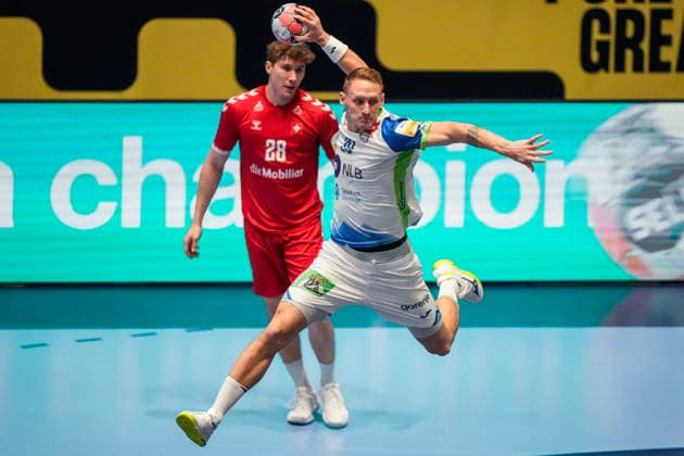 European Handball Championship, Switzerland Slovenia Baerum 20260118 Slovenia s Tilen Kodrin and Switzerland s Luca Sigrist during the European Championship handball match between Switzerland and Slovenia in Unity arena Photo Cornelius Poppe NTB Baerum Norway EDITORIAL USE ONLY RESTRICTED USE FOR BETTING COMPANIES  Copyright: xCorneliusxPoppex xNTBx