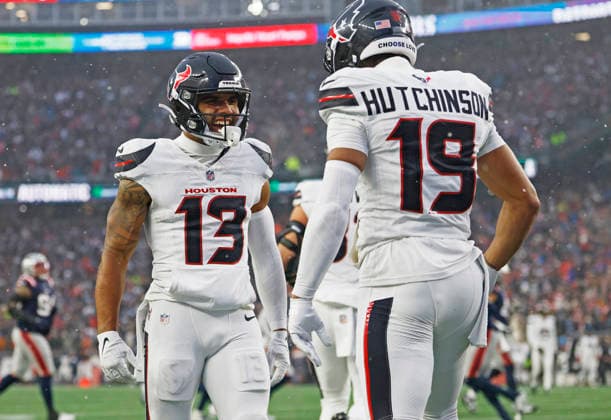 Houston wide receiver Christian Kirk (13) celebrates with wide receiver Xavier Hutchinson (19) after catching a pass for a 10-yard touchdown in the second quarter of an NFL, American Football Herren, USA Divisional round playoff game at Gillette Stadium in Foxborough, Massachusetts, on Sunday, January 18, 2026.  FOX20260118819 CJxGUNTHER
