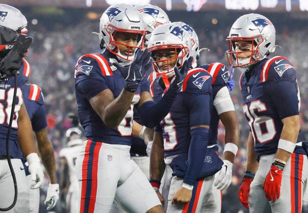 New England wide receiver Stefon Diggs (8) celebrates after catching a pass for a 7-yard touchdown against the Houston Texans in the second quarter of an NFL, American Football Herren, USA Divisional round playoff game at Gillette Stadium in Foxborough, Massachusetts, on Sunday, January 18, 2026.  FOX20260118837 CJxGUNTHER