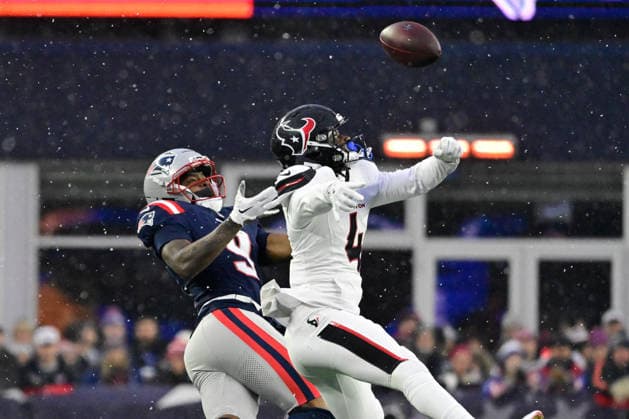 Jan 18, 2026; Foxborough, MA, USA; Houston Texans cornerback Kamari Lassiter (4) defends a pass to New England Patriots wide receiver Kayshon Boutte (9) during the first half of the AFC divisional playoff round at Gillette Stadium, in Foxborough, Massachusetts. CSM Foxborough USA - ZUMAc04_ 20260118_faf_c04_032 Copyright: xEricxCanhax