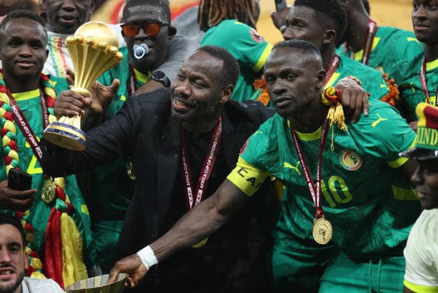 Senegal beats hosts Morocco to claim 2nd AFCON title RABAT, MOROCCO - JANUARY 19: Senegalese players raise the trophy after winning the 35th Africa Cup of Nations (AFCON 2025) final match against Morocco at the Prince Moulay Abdellah Stadium in the capital Rabat, Morocco on January 19, 2026. Senegal won the 35th Africa Cup of Nations title on Sunday, defeating hosts Morocco 1-0 after extra time in a dramatic final marked by lengthy stoppage-time scenes. Samah Zidan Anadolu Rabat Morocco. Editorial use only. Please get in touch for any other usage.  Copyright: x2026xAnadoluxSamahxZidanx