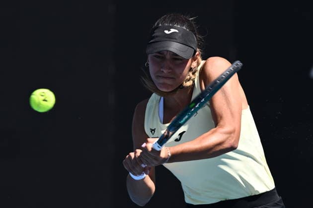 TENNIS AUSTRALIAN OPEN, Jessica Bouzas Maneiro of Spain in action during the Women™s 1st round match against Storm Hunter of Australia on day 2 of the 2026 Australian Open tennis tournament at Melbourne Park in Melbourne, Monday, January 19, 2026. ( NO ARCHIVING MELBOURNE VICTORIA AUSTRALIA  Copyright: xJOELxCARRETTx 20260119153312906673