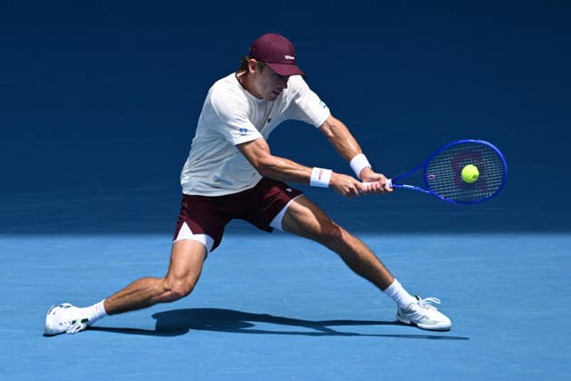 TENNIS AUSTRALIAN OPEN, Alex De Minaur of Australia in action during the Men™s 1st round match against Mackenzie McDonald of USA on day 2 of the 2026 Australian Open tennis tournament at Melbourne Park in Melbourne, Monday, January 19, 2026. ( NO ARCHIVING MELBOURNE VICTORIA AUSTRALIA  Copyright: xJOELxCARRETTx 20260119163192203363