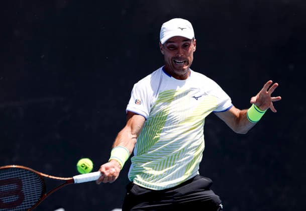 (260119) -- MELBOURNE, Jan. 19, 2026 -- Roberto Bautista Agut of Spain hits a return during the men s singles 1st round match against Shang Juncheng of China at the Australian Open tennis tournament in Melbourne, Australia, Jan. 19, 2026. ) (SP)AUSTRALIA-MELBOURNE-TENNIS-AUSTRALIAN OPEN-MEN S SINGLES-DAY 2 MaxPing 