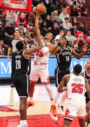 (260119) -- CHICAGO, Jan. 19, 2026 -- Chicago Bulls Isaac Okoro (2nd L) drives to the basket during the 2025-2026 NBA, Basketball Herren, USA regular season basketball game between Brooklyn Nets and Chicago Bulls at United Center in Chicago, the United States, Jan. 18, 2026. (Photo by Xinhua) (SP)U.S.-CHICAGO-BASKETBALL-NBA-NETS VS BULLS JoelxLerner 