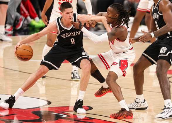 (260119) -- CHICAGO, Jan. 19, 2026 -- Brooklyn Nets Egor Demin (L) vies with Chicago Bulls Ayo Dosunmu during the 2025-2026 NBA, Basketball Herren, USA regular season basketball game between Brooklyn Nets and Chicago Bulls at United Center in Chicago, the United States, Jan. 18, 2026. (Photo by Xinhua) (SP)U.S.-CHICAGO-BASKETBALL-NBA-NETS VS BULLS JoelxLerner 