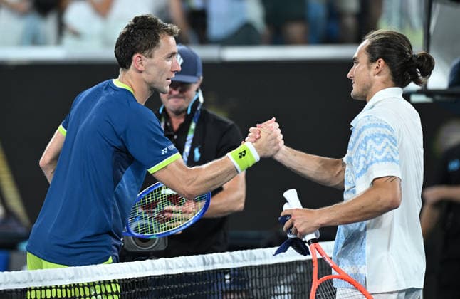 TENNIS AUSTRALIAN OPEN, Casper Ruud of Norway (l) shakes hands after winning the Men™s 1st round match against Mattia Bellucci of Italy on day 2 of the 2026 Australian Open tennis tournament at Melbourne Park in Melbourne, Monday, January 19, 2026. ( NO ARCHIVING MELBOURNE VICTORIA AUSTRALIA  Copyright: xJAMESxROSSx 20260119162706468142