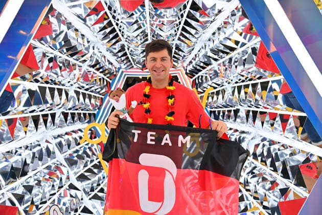 Philipp NAWRATH (GER),Biathlon, mit Team D Fahne,Flagge schwarz rot gold, Einzelbild,angeschnittenes Einzelmotiv, Halbfigur,halbe Figur. Einkleidung der Deutschen Olympiamannschaft, Einkleidung Team Deutschland fuer die Winterspiele 2026 in Mailand und Cortina am 19.01.2026, *** Philipp NAWRATH GER, Biathlon, with Team D flag, flag black red gold, single picture, cropped single motif, half figure, half figure Dressing of the German Olympic Team, Dressing Team Germany for the Winter Games 2026 in Milan and Cortina on 19 01 2026,