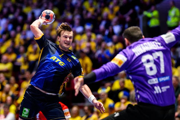 260119 Jonathan Carlsbogard of Sweden and goalkeeper David Nikabadze of Georgia during the EHF European Handball Championship preliminary round match between Georgia and Sweden on January 19, 2026 in Malmö. Photo: Petter Arvidson BILDBYRAN kod PA PA1125 handball handboll handball handbolls-em 2026 georgien sverige sweden ehf european handball championship georgia bbeng Copyright: PETTERxARVIDSON BB260119PA128