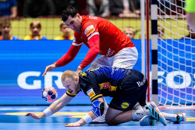 260119 Felix Möller of Sweden and Erekle Arsenashvili of Georgia during the EHF European Handball Championship preliminary round match between Georgia and Sweden on January 19, 2026 in Malmö. Photo: Petter Arvidson BILDBYRAN kod PA PA1125 handball handboll handball handbolls-em 2026 georgien sverige sweden ehf european handball championship georgia bbeng Copyright: PETTERxARVIDSON BB260119PA168