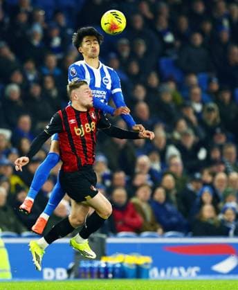Kaoru Mitoma of Brighton and Hove Albion and Adrien Truffert of AFC Bournemouth. Brighton and Hove Albion v AFC Bournemouth, Premier League, Football, American Express Community Stadium, Brighton, UK - 19 Jan 2026Brighton American Express Community Stadi United Kingdom EDITORIAL USE ONLY No use with unauthorised audio, video, data, fixture lists, club league logos or live services. Online in-match use limited to 120 images, no video emulation. No use in betting, games or single club league player publications. Copyright: xJamesxMarsh Shutterstockx 16348254ae