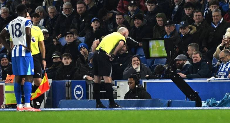 Referee Paul Tierney check the VAR to give Bournemouth a penalty in the first half during the Premier League match between Brighton and Hove Albion and AFC Bournemouth at the American Express Stadium , Brighton , UK - 19th January 2026 Brighton vs Bournemouth Premier League Football, Amex Stadium, Sussex, UK - 19 Jan 2026Brighton Amex Stadium Sussex United Kingdom Editorial use only. No merchandising. For Football images FA and Premier League restrictions apply inc. no internet mobile usage without FAPL license - for details contact Football Dataco  Copyright: xSimonxDack TPI Shutterstockx 16370121y