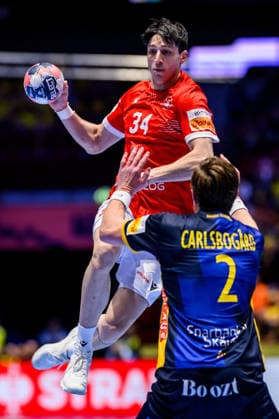 260119 Miriani Gavashelishvili of Georgia and Jonathan Carlsbogard of Sweden during the EHF European Handball Championship preliminary round match between Georgia and Sweden on January 19, 2026 in Malmö. Photo: Petter Arvidson BILDBYRAN kod PA PA1125 handball handboll handball handbolls-em 2026 georgien sverige sweden ehf european handball championship georgia bbeng Copyright: PETTERxARVIDSON BB260119PA233
