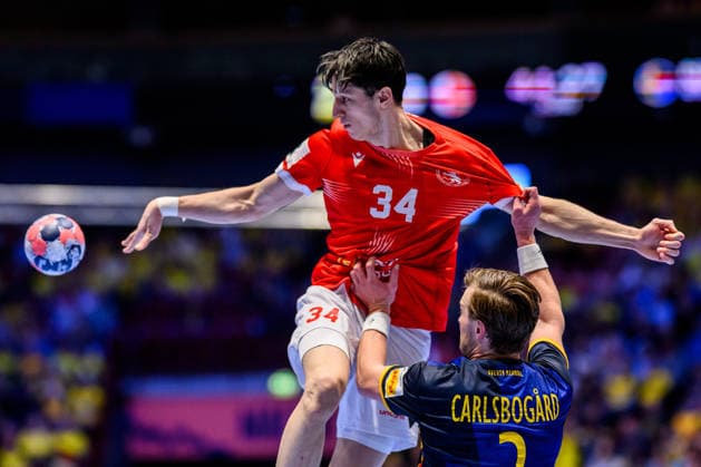 260119 Miriani Gavashelishvili of Georgia and Jonathan Carlsbogard of Sweden during the EHF European Handball Championship preliminary round match between Georgia and Sweden on January 19, 2026 in Malmö. Photo: Petter Arvidson BILDBYRAN kod PA PA1125 handball handboll handball handbolls-em 2026 georgien sverige sweden ehf european handball championship georgia bbeng Copyright: PETTERxARVIDSON BB260119PA235