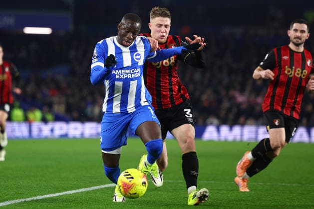 Brighton and Hove, England, 19th January 2026. Yankuba Minteh of Brighton and Hove Albion and Adrien Truffert of Bournemouth challenge for the ball during the Brighton and Hove Albion vs AFC Bournemouth Premier League match at the AMEX Stadium, Brighton and Hove. Picture credit should read: Paul Terry Sportimage EDITORIAL USE ONLY. No use with unauthorised audio, video, data, fixture lists, club league logos or live services. Online in-match use limited to 120 images, no video emulation. No use in betting, games or single club league player publications. SPI_050_PT_Brighton_Bournemouth SPI-4463-0050