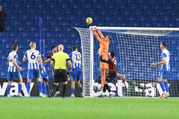 Brighton and Hove Albion v Bournemouth, Premier League Bart Verbruggen Goalkeeper of Brighton and Hove Albion makes a vital diving save from Evanilson Forward of Bournemouth FC during the Premier League match between Brighton and Hove Albion and Bournemouth at the American Express Stadium, Brighton and Hove, UK on 19 January 2026. Brighton and Hove American Express Stadium East Sussex UK Editorial use only DataCo restrictions apply See www.football-dataco.com , Copyright: xJeffxMoodx PSI-23593-0109