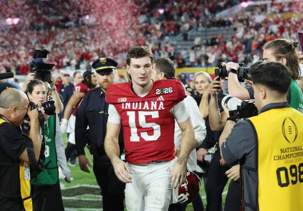 Indiana quarterback Fernando Mendoza (15) walks across the field after the Hoosiers defeated the Miami Hurricanes 27-21 in the NCAA, College League, USA College Football Championship game at Hard Rock Stadium in Miami, Florida, on Monday, January 19, 2026.  MIA20260119868 AARONxJOSEFCZYK