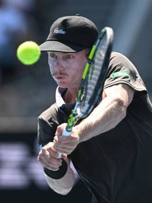 TENNIS AUSTRALIAN OPEN, Dane Sweeny of Australia returns during the Men™s first round match agains Gael Monfils of France on day 3 of the 2026 Australian Open tennis tournament at Melbourne Park in Melbourne, Tuesday, January 20, 2026. ( NO ARCHIVING MELBOURNE VICTORIA AUSTRALIA  Copyright: xLUKASxCOCHx 20260120195273063793