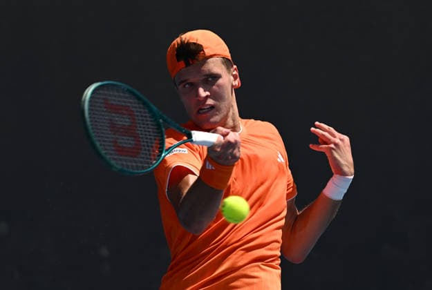 TENNIS AUSTRALIAN OPEN, Jakub Mensik of Czech Republic in action during the Men™s 1st round match against Pablo Carreno Bustaof Spain on day 3 of the 2026 Australian Open tennis tournament at Melbourne Park in Melbourne, Tuesday, January 20, 2026. ( NO ARCHIVING MELBOURNE VICTORIA AUSTRALIA  Copyright: xJOELxCARRETTx 20260120186320429316