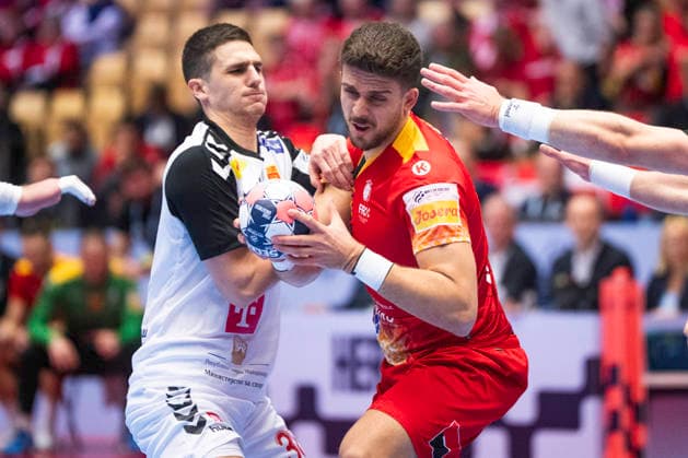 EHF Handball European Championship, EM, Europameisterschaft North Macedonia - Romania Romania s Tudor Botea in action with North Macedonia s Ivan Djonov during the men s handball match between North Macedonia and Romania in EHF Euro 2026 group B at Jyske Bank Boxen in Herning on Tuesday, January 20, 2026. (Photo: Bo Amstrup Ritzau Scanpix) , Herning Denmark Mors Copyright: BoxAmrstrupx xRitzauxScanpix BoxAmstrupx spdk20260120-185345-L