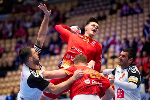 EHF Handball European Championship, EM, Europameisterschaft North Macedonia - Romania Romania s Daniel Stanciuc in action with North Macedonia s Nikola Markoski during the men s handball match between North Macedonia and Romania in EHF Euro 2026 group B at Jyske Bank Boxen in Herning on Tuesday, January 20, 2026. (Photo: Bo Amstrup Ritzau Scanpix) , Herning Denmark Mors Copyright: BoxAmrstrupx xRitzauxScanpix BoxAmstrupx spdk20260120-185133-L