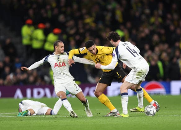 London, England, 20th January 2026. Xavi Simons of Tottenham (l) tackles Jobe Bellingham of Borussia Dortmund (c) along with Archie Gray of Tottenham (r) during the Tottenham Hotspur vs Borussia Dortmund UEFA Champions League match at the Tottenham Hotspur Stadium, London. Picture credit should read: David Klein Sportimage EDITORIAL USE ONLY. No use with unauthorised audio, video, data, fixture lists, club league logos or live services. Online in-match use limited to 120 images, no video emulation. No use in betting, games or single club league player publications. SPI_075_DK_Spurs_Dortmund SPI-4464-0077