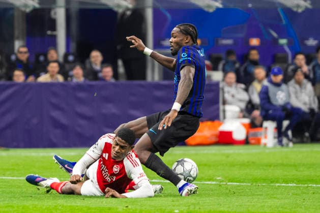 MILAN, ITALY - JANUARY 20: Marcus Thuram of Inter R) against Cristhian Mosquera of Arsenal L) during the UEFA Champions League 2025 26 League Phase MD7 match between FC Internazionale Milano and Arsenal FC at Stadio San Siro on January 20, 2026 in Milan, Italy. Milan Stadio San Siro Italy Copyright: xJustPictures.ch JarixPestelaccix jp-en-EuSpIm-JP4_JAR_Inter_Arsenal_20Jan2026_10021