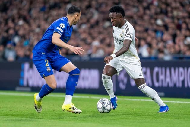 Real Madrid CF s Vinicius Junior (r) and AS Monaco s Vanderson de Oliveira Campos during Champions League 2025 2026 Round 7 match. January 20,2026. (2025012006)