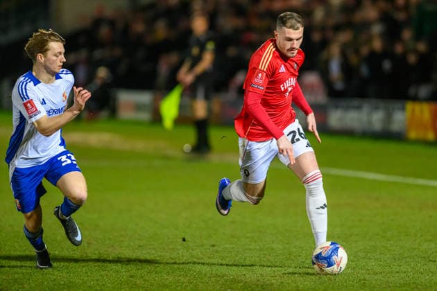 Salford City v Swindon Town - Emirates FA Cup Third Round Ryan Graydon of Salford City FC is under pressure from Joel McGregor of Swindon Town FC during the Emirates FA Cup Third Round match between Salford City and Swindon Town at The Peninsula Stadium in Salford, on January 20, 2026. Salford Lancashire United Kingdom  Copyright: xMIxNewsx originalFilename:fletcher-salfordc260120_npruN.jpg