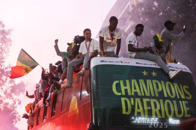 Senegal celebrates AFCON 2025 title in Dakar DAKAR, SENEGAL - JANUARY 20: AFCON 2025 champions Senegal national team, Nationalteam greet supporters from the team bus during victory celebrations in the streets, as thousands of fans accompany the parade in Dakar, Senegal on January 20, 2026. Cem Ozdel Anadolu Dakar Senegal. Editorial use only. Please get in touch for any other usage.  Copyright: x2026xAnadoluxCemxOzdelx