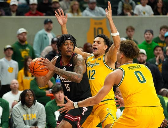 January 20, 2026, Waco, Texas, USA: Texas Tech forward JT TOPPIN (15) works against Baylor guard MICHAEL RATAJ (12) and guard DAN SKILLINGS JR. (0) during a college basketball game between the Baylor Bears and the Texas Tech Red Raiders on January 20, 2026 in Waco, Texas. Texas Tech won, 92-73. Waco USA - ZUMAc201 20260120_zap_c201_066 Copyright: xScottxColemanx