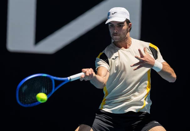 (260121) -- MELBOURNE, Jan. 21, 2026 -- Jaime Faria of Portugal hits a return during the men s singles 2nd round match against Andrey Rublev of Russia at the Australian Open tennis tournament in Melbourne, Australia, Jan. 21, 2026 (Photo by Xinhua) (SP)AUSTRALIA-MELBOURNE-TENNIS-AUSTRALIAN OPEN-MEN S SINGLES-DAY 4 HuxJingchen 