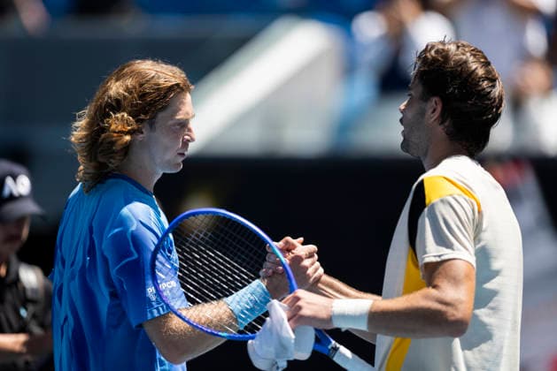 (260121) -- MELBOURNE, Jan. 21, 2026 -- Andrey Rublev (L) of Russia and Jaime Faria of Portugal react during the men s singles 2nd round match between Andrey Rublev of Russia and Jaime Faria of Portugal at the Australian Open tennis tournament in Melbourne, Australia, Jan. 21, 2026 (Photo by Xinhua) (SP)AUSTRALIA-MELBOURNE-TENNIS-AUSTRALIAN OPEN-MEN S SINGLES-DAY 4 HuxJingchen 