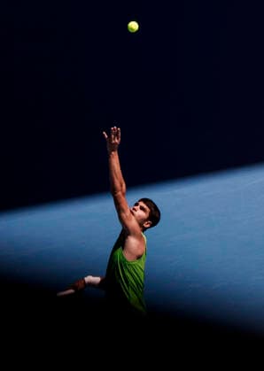 (260121) -- MELBOURNE, Jan. 21, 2026 -- Carlos Alcaraz of Spain serves during the men s singles 2nd round match against Yannick Hanfmann of Germany at the Australian Open tennis tournament in Melbourne, Australia, Jan. 21, 2026. ) (SP)AUSTRALIA-MELBOURNE-TENNIS-AUSTRALIAN OPEN-MEN S SINGLES-DAY 4 MaxPing 