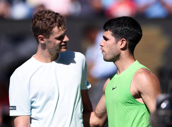(260121) -- MELBOURNE, Jan. 21, 2026 -- Carlos Alcaraz (R) of Spain and Yannick Hanfmann of Germany react after the men s singles 2nd round match between Carlos Alcaraz of Spain and Yannick Hanfmann of Germany at the Australian Open tennis tournament in Melbourne, Australia, Jan. 21, 2026. ) (SP)AUSTRALIA-MELBOURNE-TENNIS-AUSTRALIAN OPEN-MEN S SINGLES-DAY 4 MaxPing 