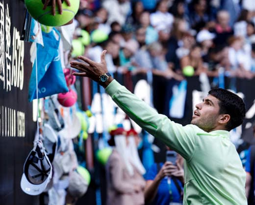 (260121) -- MELBOURNE, Jan. 21, 2026 -- Carlos Alcaraz of Spain reacts with fans after the men s singles 2nd round match against Yannick Hanfmann of Germany at the Australian Open tennis tournament in Melbourne, Australia, Jan. 21, 2026. ) (SP)AUSTRALIA-MELBOURNE-TENNIS-AUSTRALIAN OPEN-MEN S SINGLES-DAY 4 MaxPing 