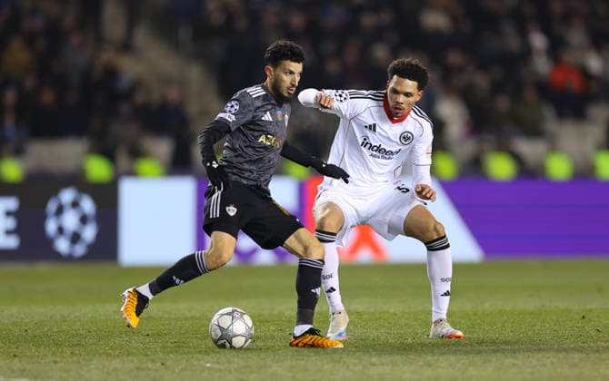 21.01.2026, Fussball UEFA Champions League, Qarabag Agdam FK - Eintracht Frankfurt, v.l., Abdellah Zoubir (Qarabag Agdam FK), Pharell Nnamdi Collins (Eintracht Frankfurt) DFL DFB REGULATIONS PROHIBIT ANY USE OF PHOTOGRAPHS AS IMAGE SEQUENCES AND OR QUASI-VIDEO. xdcx Copyright: HMBxMedia Claus