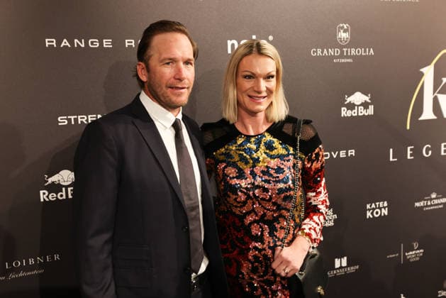 ALPINE SKIING - FIS WC Kitzbuehel KITZBUEHEL,AUSTRIA,21.JAN.26 - ALPINE SKIING - FIS World Cup, Hahnenkamm-race, side event, Kitz Legends Night. Image shows Bode Miller and Maria Riesch.  GEPAxpictures xMathiasxMandl