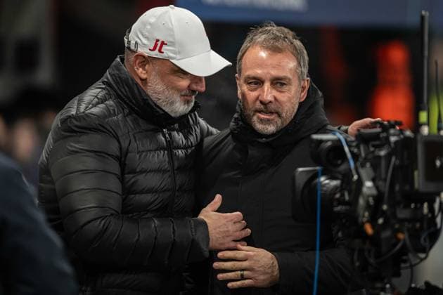 Jindrich Trpisovsky say hello to Hansi Flick during UEFA Champions league match, SK Slavia Praha - FC Barcelona, Barca , 21 january 2026, Fortuna Arena, Praha, Czech republic Copyright: xMICHALxFAJT,ZOSPORTU.SKx MAR_9640
