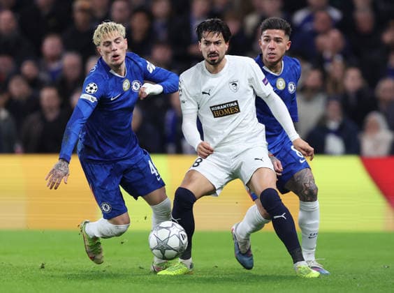London, England, 21st January 2026. Pepe of Pafos FC (C) is challenged by Alejandro Garnacho of Chelsea (L) and Enzo Fernandez of Chelsea during the Chelsea vs Pafos FC UEFA Champions League match at Stamford Bridge, London. Picture credit should read: David Klein Sportimage EDITORIAL USE ONLY. No use with unauthorised audio, video, data, fixture lists, club league logos or live services. Online in-match use limited to 120 images, no video emulation. No use in betting, games or single club league player publications. SPI_012_DK_CHELSEA_PAFOS SPI-4466-0012