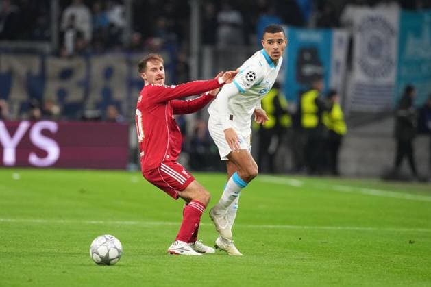 Mason Greenwood of Marseille and Alexis Mac Allister of Liverpool Marseille v Liverpool, UEFA Champions League, Group Stage, Football, Orange Velodrome, Marseille, France - 21 Jan 2026Marseille Orange Vélodrome France EDITORIAL USE ONLY No use with unauthorised audio, video, data, fixture lists, club league logos or live services. Online in-match use limited to 120 images, no video emulation. No use in betting, games or single club league player publications. Copyright: xDavexWinter Shutterstockx 16348361av