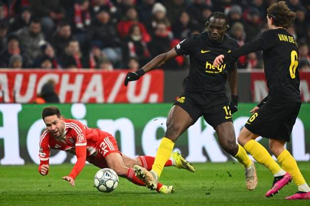 Bayern Munchen v Royale Union Saint-Gilloise - UEFA Champions League MUNICH, GERMANY - JANUARY 21 : Guerreiro Raphael defender of Bayern Munchen and David Promise Oluwatobi forward of Union Saint-Gilloise during the UEFA Champions League 2025 26 League Phase MD7 match between FC Bayern Munchen and Royale Union Saint-Gilloise on January 21, 2026 in Munich, Germany, 21 01 2026 Munich Germany  Copyright: xVincentxKalutx