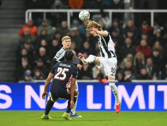 Anthony Gordon of Newcastle United gets to the ball ahead of Kiliann Sildillia of PSV Eindhoven Newcastle United v PSV Eindhoven, UEFA Champions League, Group Stage, Football, St James Park, Newcastle, UK - 21 Jan 2026Newcastle St James Park United Kingdom EDITORIAL USE ONLY No use with unauthorised audio, video, data, fixture lists, club league logos or live services. Online in-match use limited to 120 images, no video emulation. No use in betting, games or single club league player publications. Copyright: xRichardxLee Shutterstockx 16348359aj