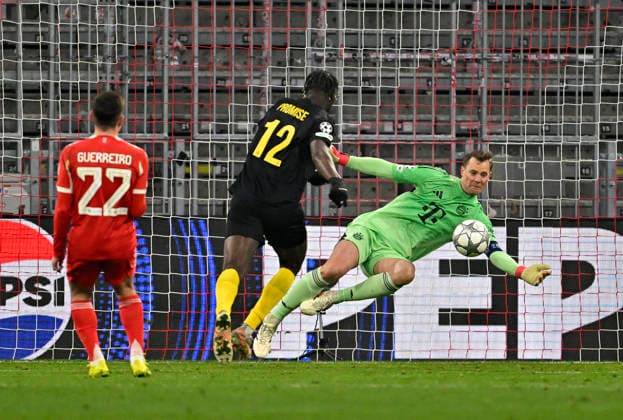 21.01.2026, Fussball UEFA Championsleague 2025 2026: Vorrunde 7.Spieltag, FC Bayern München - Union Saint-Gilloise, in der Allianz-Arena München. v.l. Raphael Guerreiro (FC Bayern München), Promise David (Union Saint-Gilloise) und Torwart Manuel Neuer (FC Bayern München)