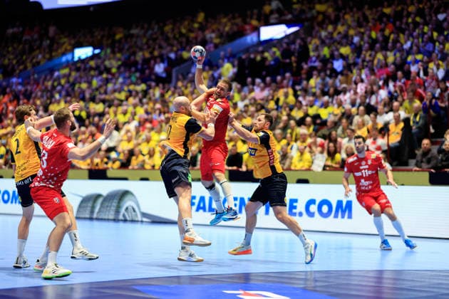 MALMÖ, SWEDEN 20260121 Sweden s Oliver Wigmark and Albin Lagergren try to stop Croatia s Luka Cindric during the group stage match of the European Handball Championship Group E between Sweden and Croatia at Malmö Arena, Malmö, Sweden, January 21, 2026. MALMÖ SWEDEN x10600x